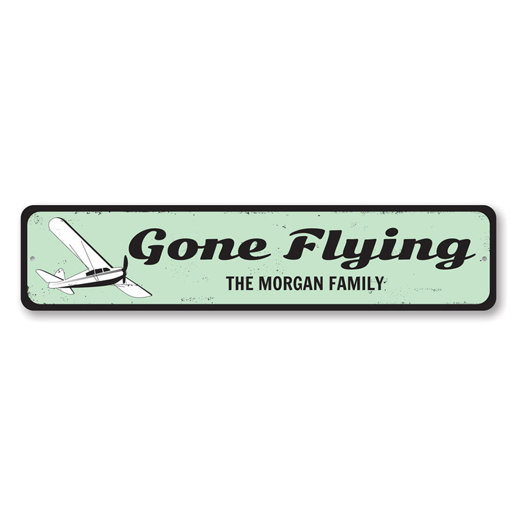 Flying Metal Sign