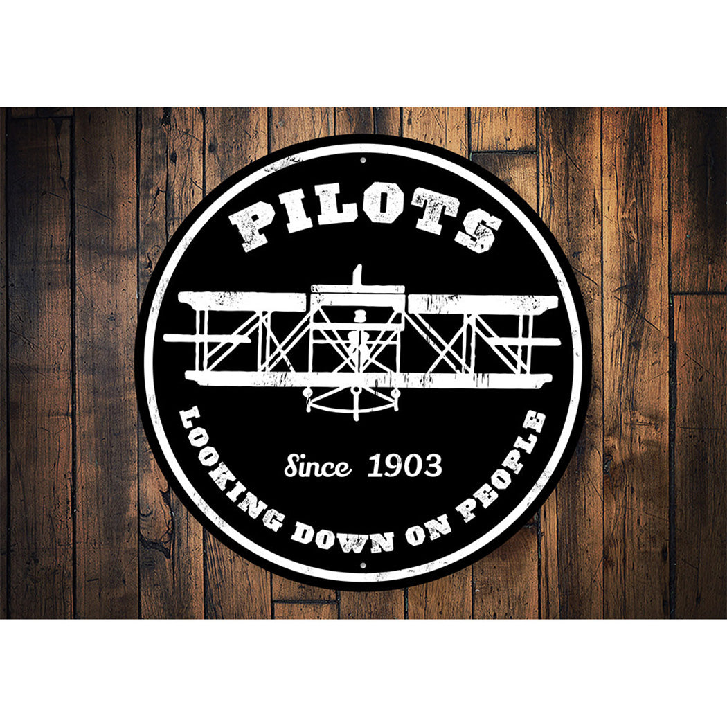 Pilots Looking Down Since 1903 Sign
