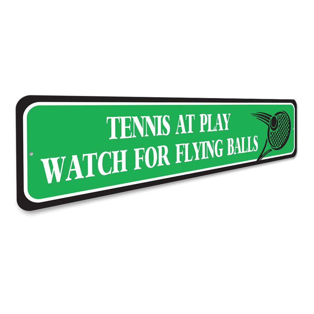 Watch For Flying Tennis Balls Sign
