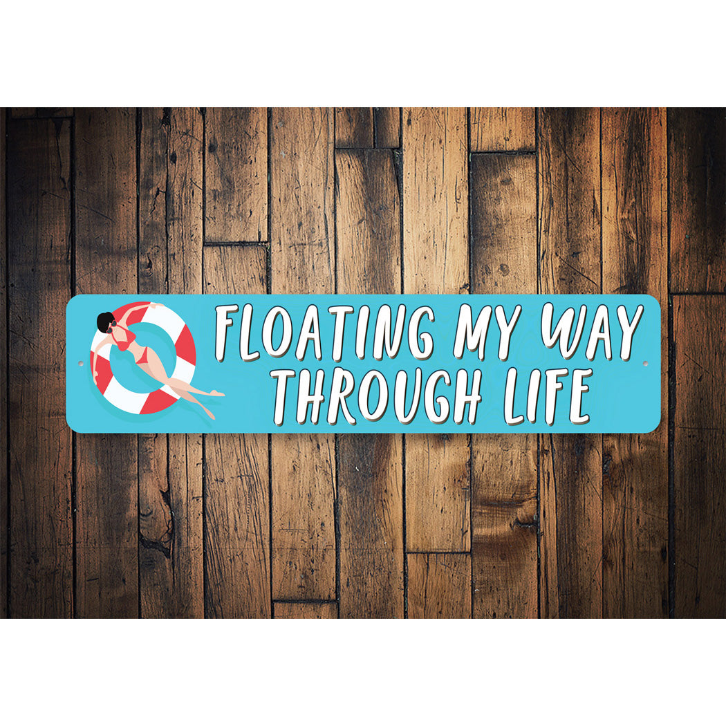 Floating My Way Through Life Sign