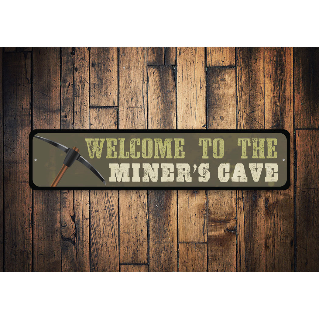 The Miners Cave Sign
