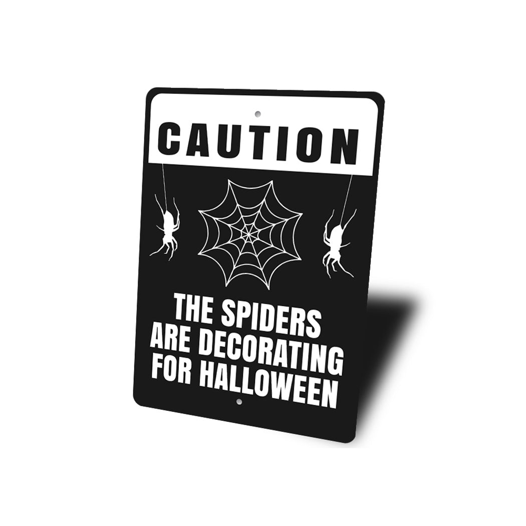 The Spiders Are Decorating For Halloween Sign