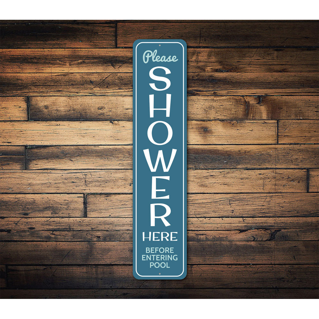 Please Shower Here Before Entering Pool Sign