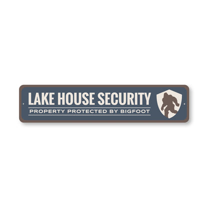 Lake House Security Property Protected By Bigfoot Sign
