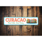 Curacao More Color Less Hurry Caribbean Sign