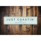 Just Coastin New Smyrna Beach Sign