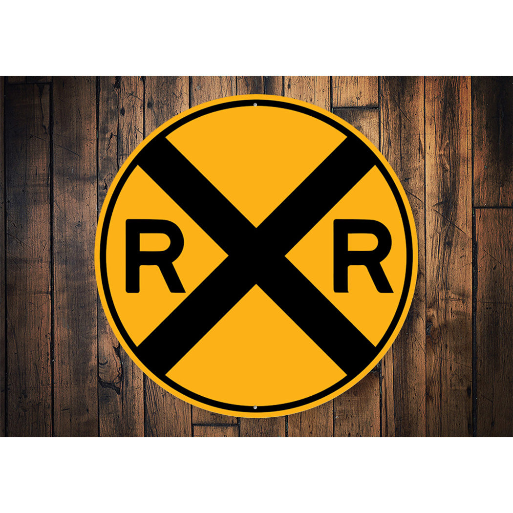 Circular Railroad Warning Sign With Large Black 'X' and 'R' On Each Side