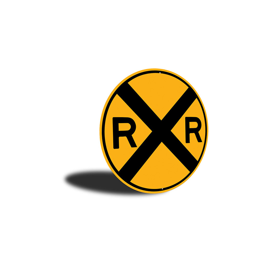 Circular Railroad Warning Sign With Large Black 'X' and 'R' On Each Side