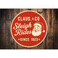 Claus And Company Sleigh Rides Sign