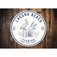 Laguna Beach Sand Sun Pelican Round Sign