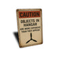 Caution Objects In Hangar Are More Expensive Sign