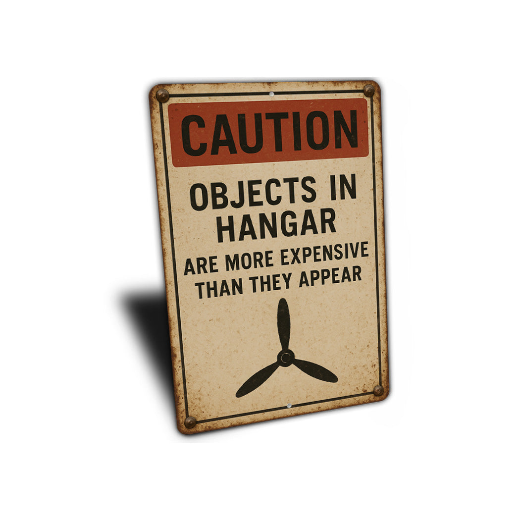 Caution Objects In Hangar Are More Expensive Sign