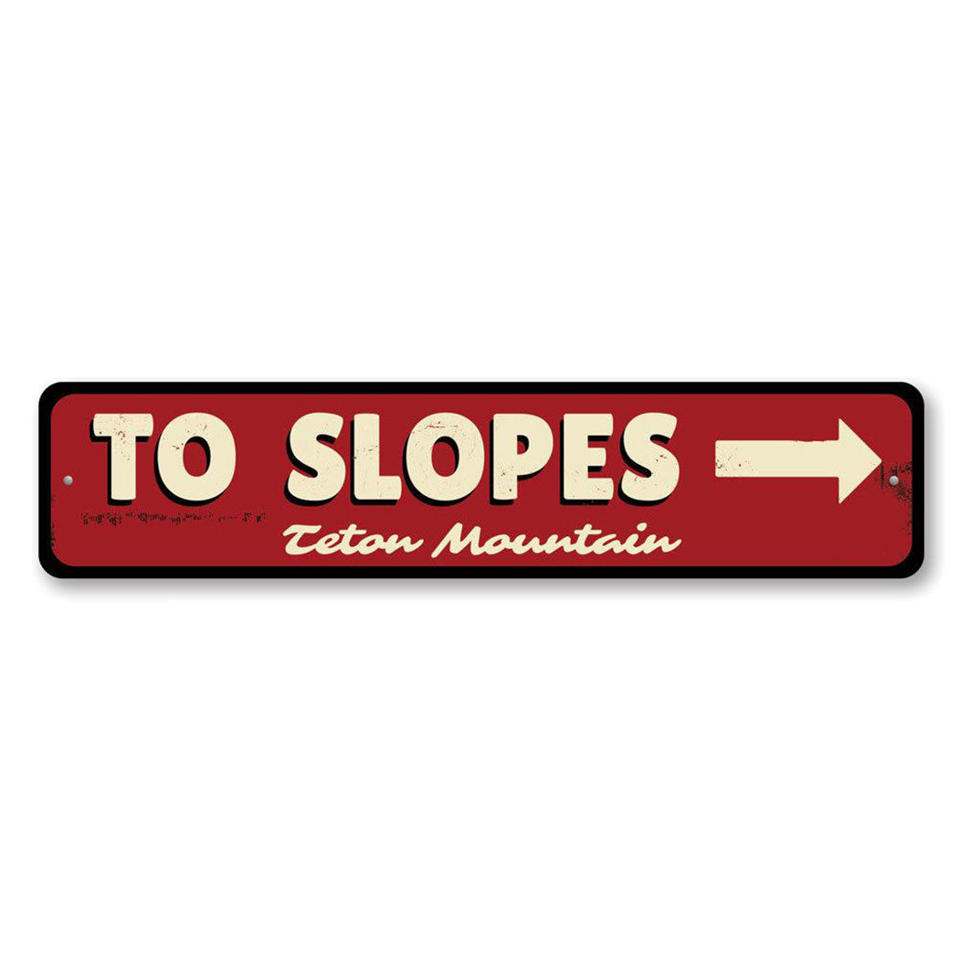 To Slopes Arrow Sign