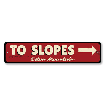 To Slopes Arrow Metal Sign