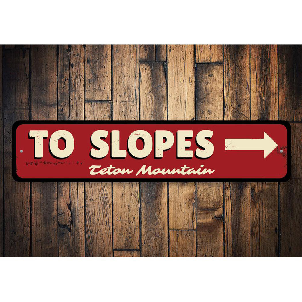 To Slopes Arrow Sign