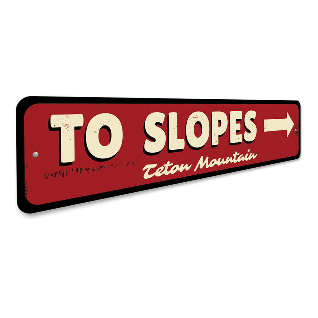 To Slopes Arrow Sign