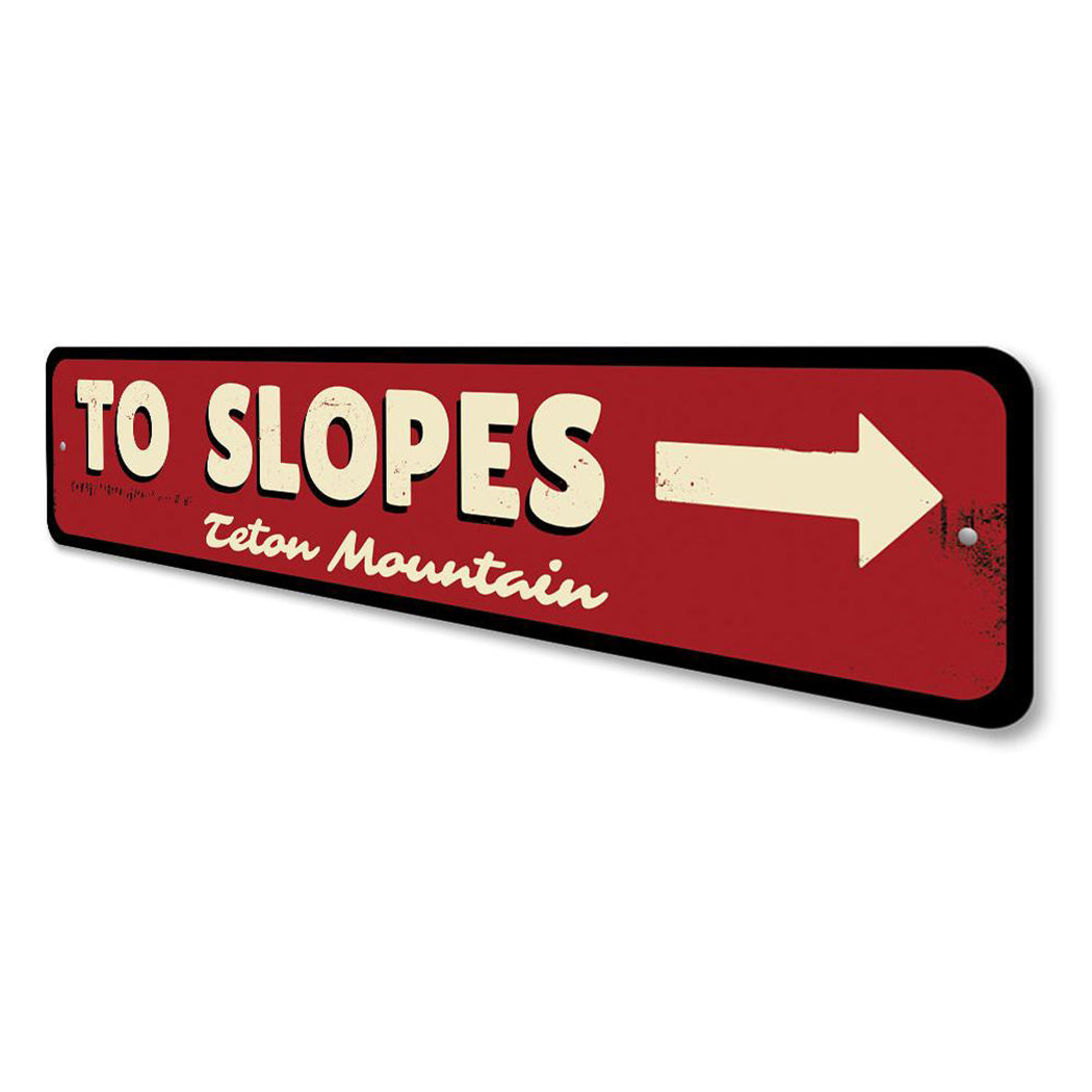 To Slopes Arrow Sign