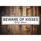 Beware of Kisses Sign