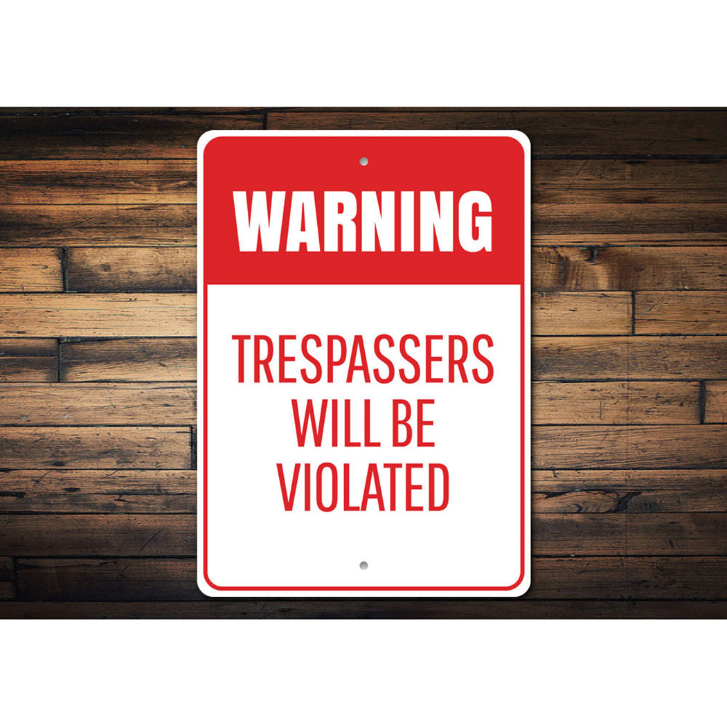 Trespassers Will Be Violated Sign