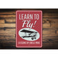 Learn to Fly Plane Lessons Sign