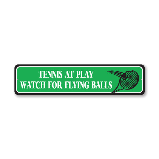 Watch For Flying Tennis Balls Sign