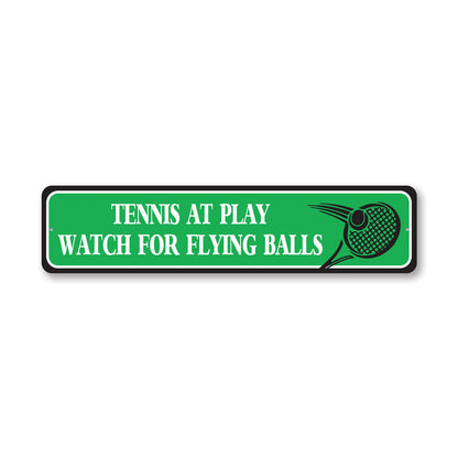 Watch For Flying Tennis Balls Metal Sign