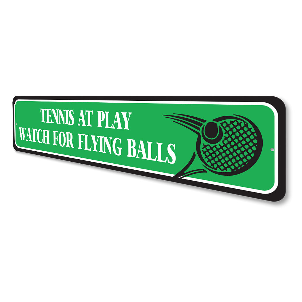 Watch For Flying Tennis Balls Sign