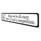 We are All Crazy Here Sign