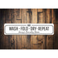 Wash Fold Dry Repeat Sign