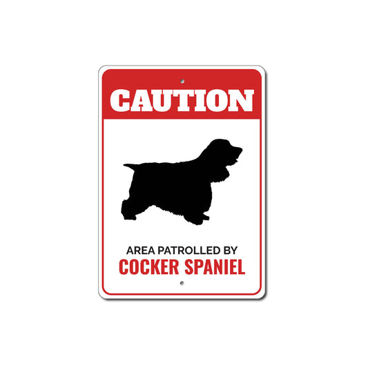 Patrolled By Cocker Spaniel Caution Sign