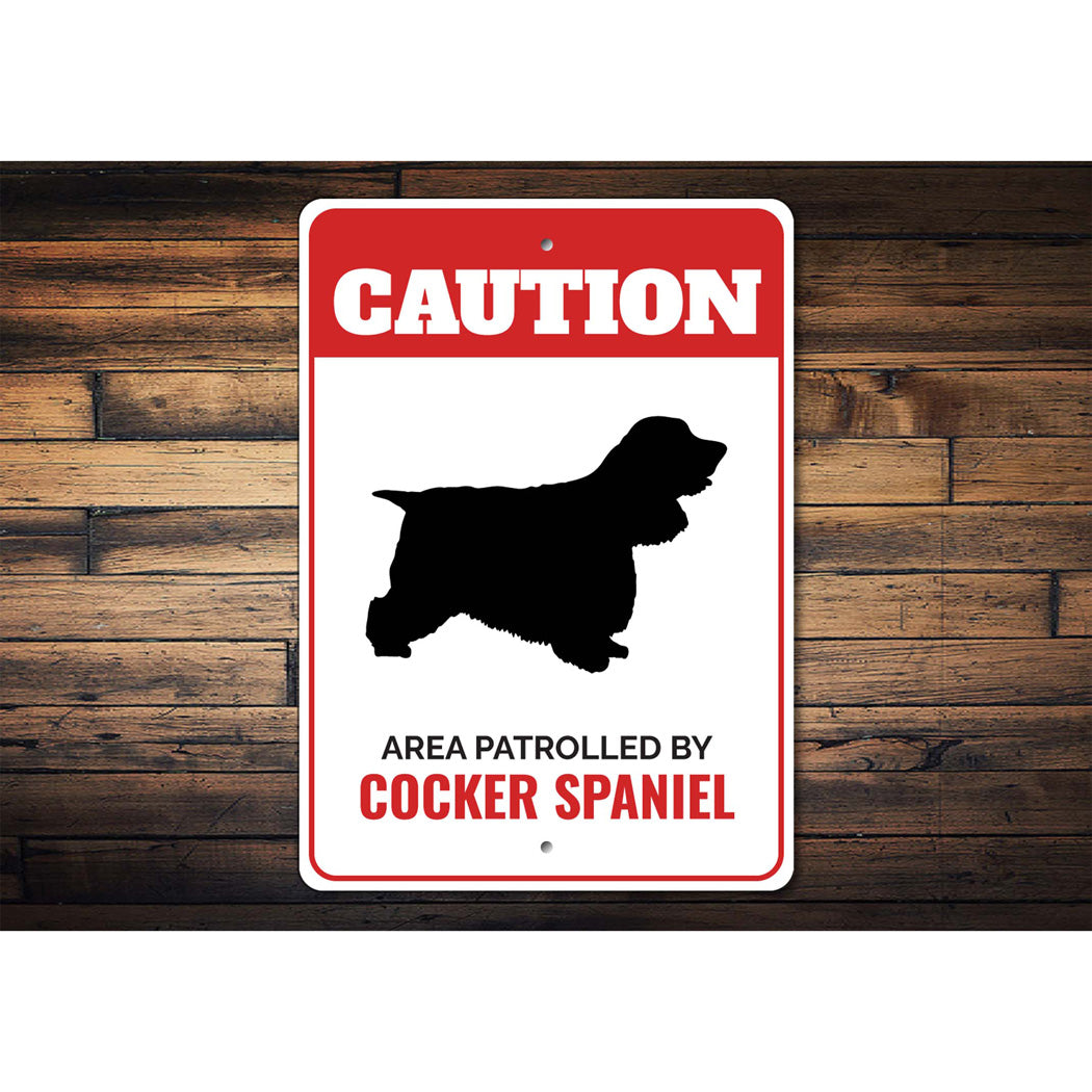 Patrolled By Cocker Spaniel Caution Sign