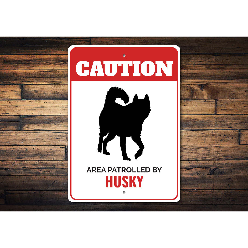 Patrolled By Husky Caution Sign