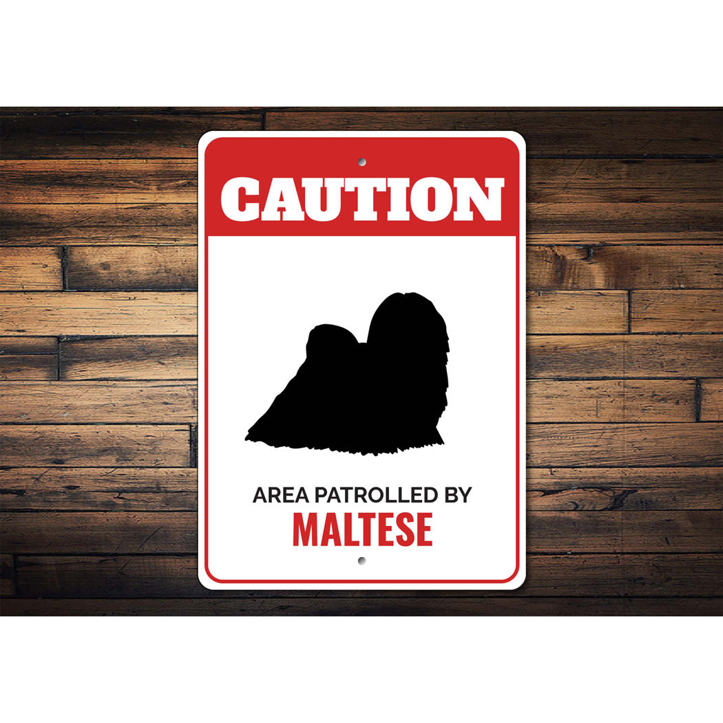 Patrolled By Maltese Caution Sign