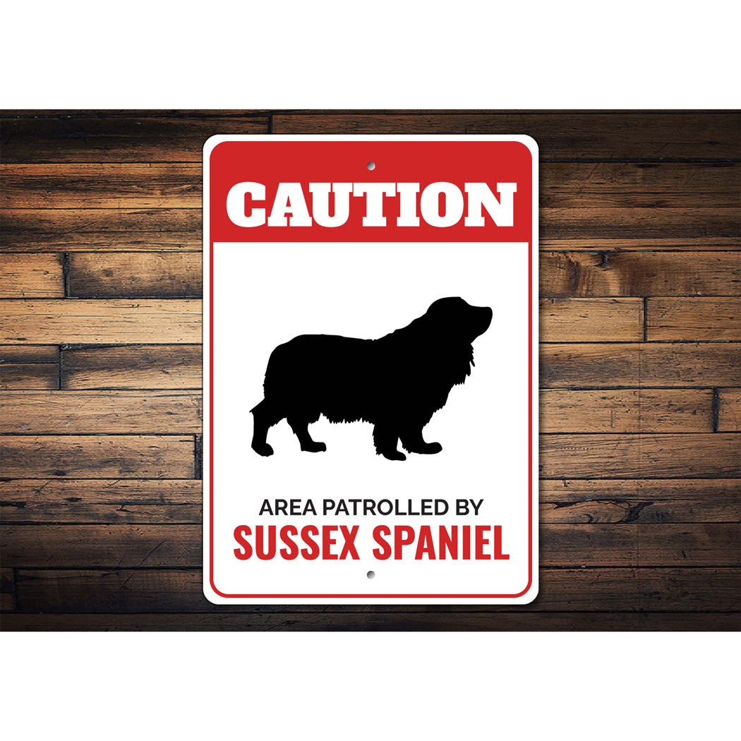 Patrolled By Sussex Spaniel Caution Sign